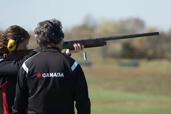 Julia enjoying breaking targets during her first trapshooting session at The Trapshooting Academy